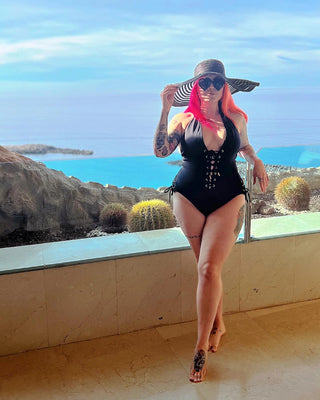 Mum customer wearing the lace me up swimsuit